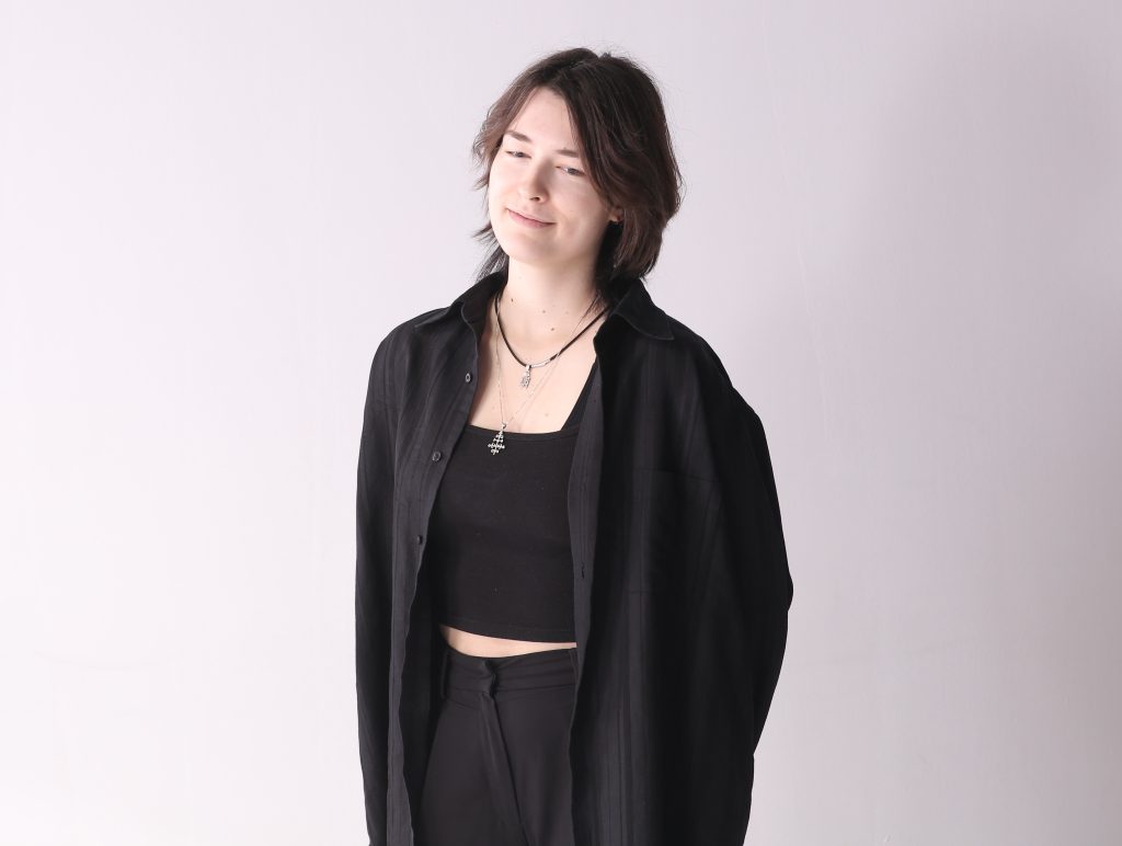 Alise Stopina on gray background for bodyshot